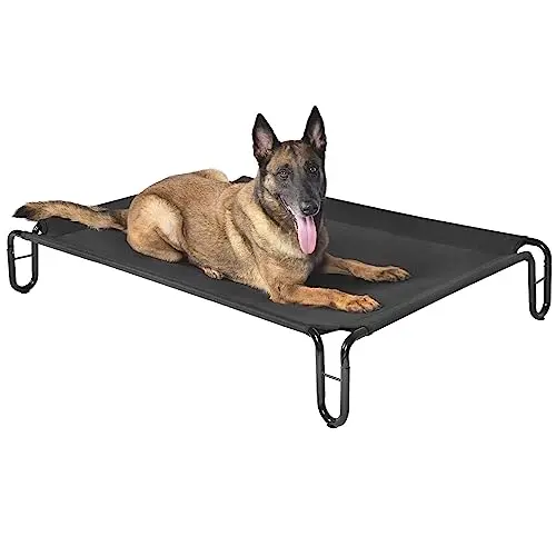 pettycare black elevated dog cot with U-shaped frame in a backyard